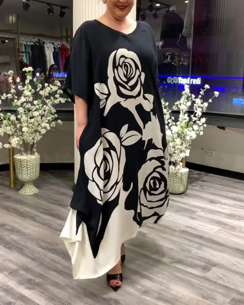 Zwarte jurk met rozenprint elegant design