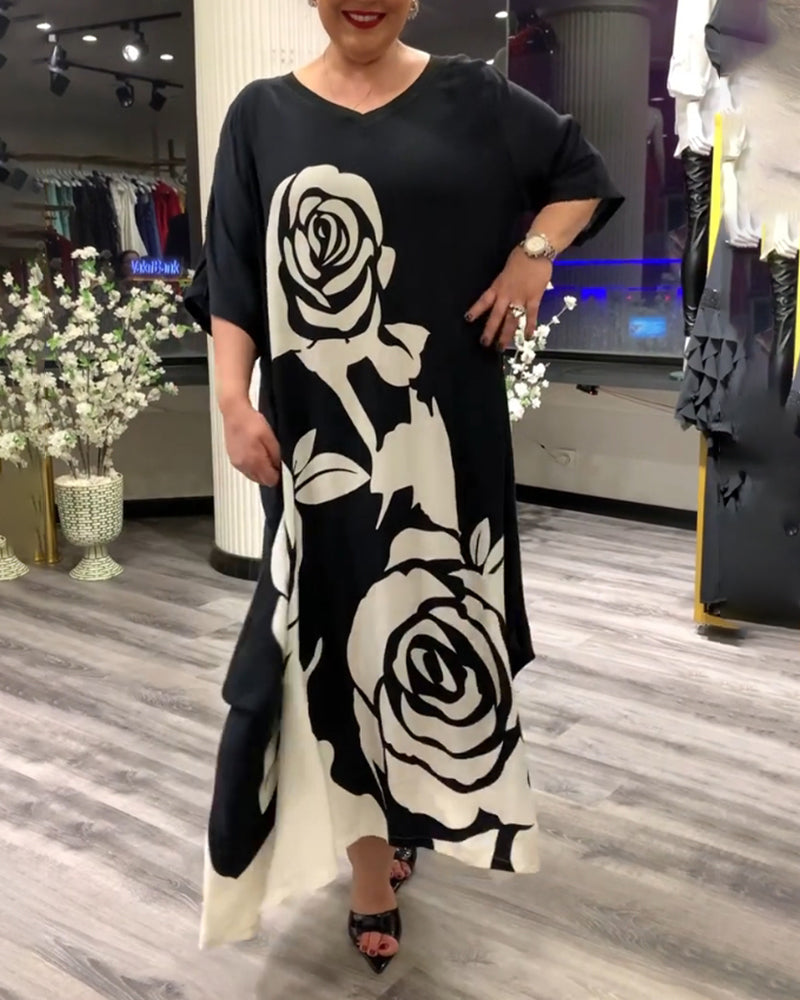 Zwarte jurk met rozenprint elegant design
