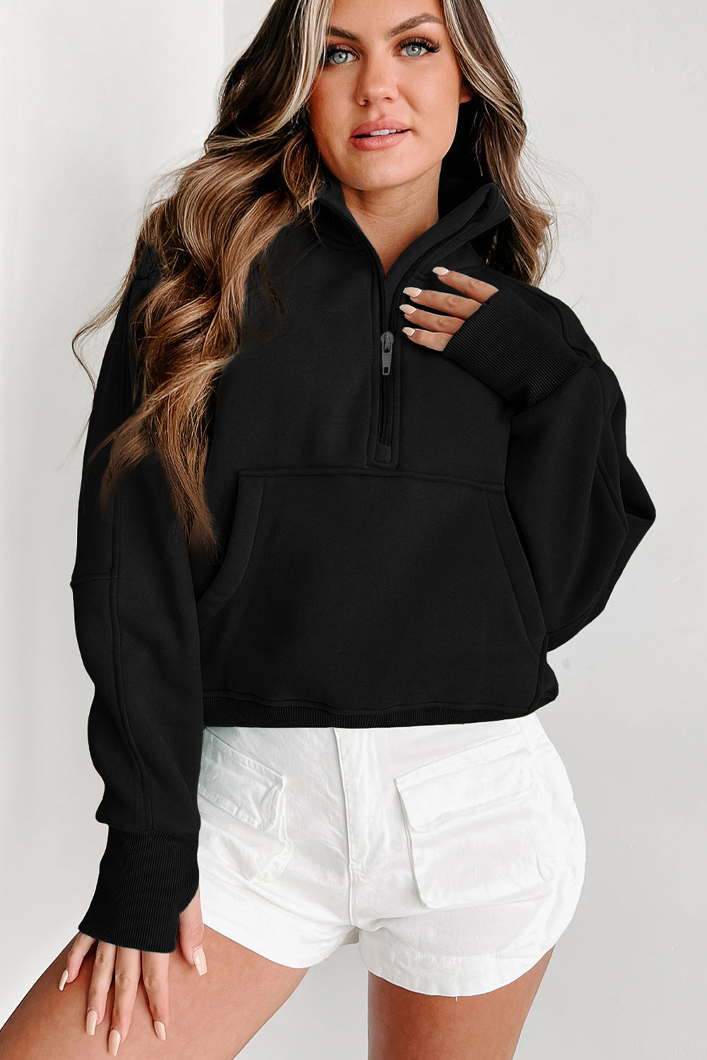 Stijlvolle Bruine Sweatshirt met Rits, Opstaande Kraag en Duimgaten – Perfect voor Casual Comfort