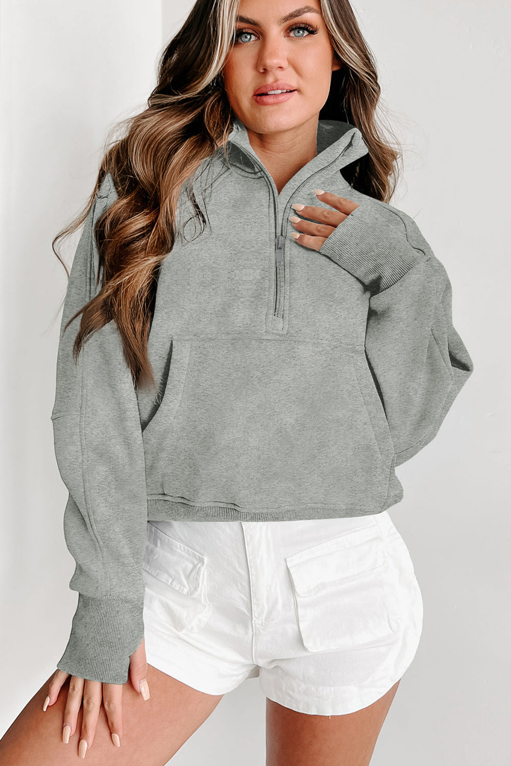 Stijlvolle Bruine Sweatshirt met Rits, Opstaande Kraag en Duimgaten – Perfect voor Casual Comfort
