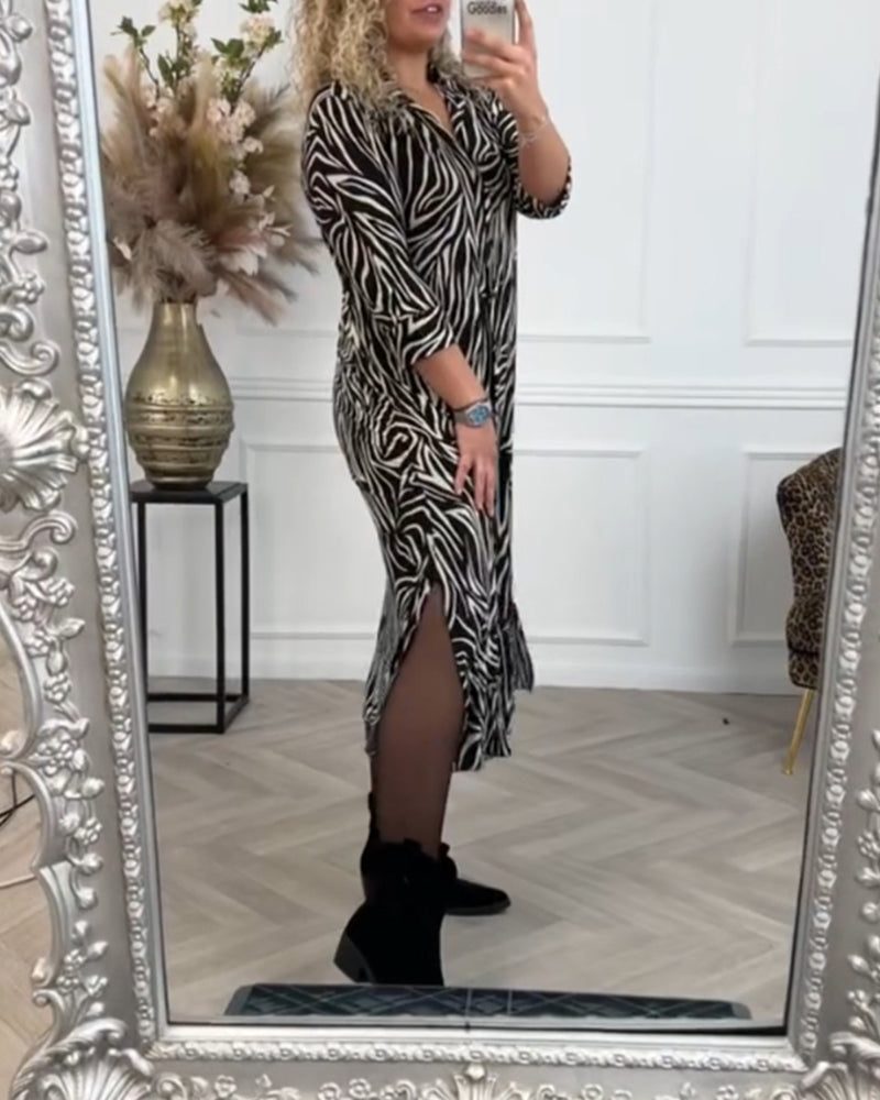 Zwarte zure jurk met zebraprint en revers elegant