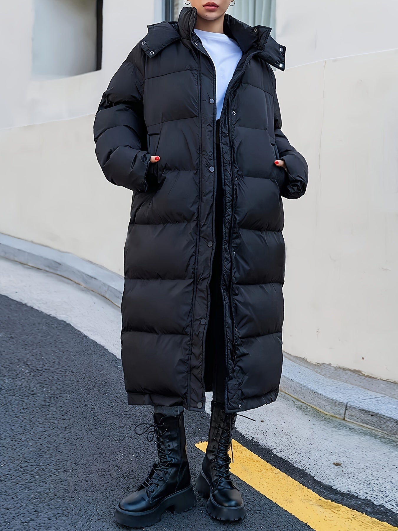 Warme casual lange zwarte gewatteerde jas met capuchon voor dames | Ideaal voor de winter