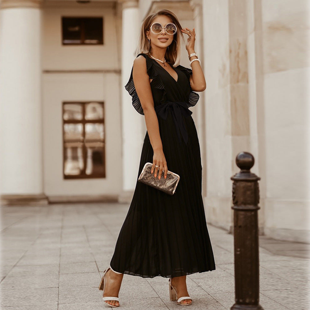 Zwarte maxi jurk met plooien elegant en tijdloos