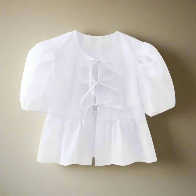 Zomerse katoenen blouse met strik en pofmouwen
