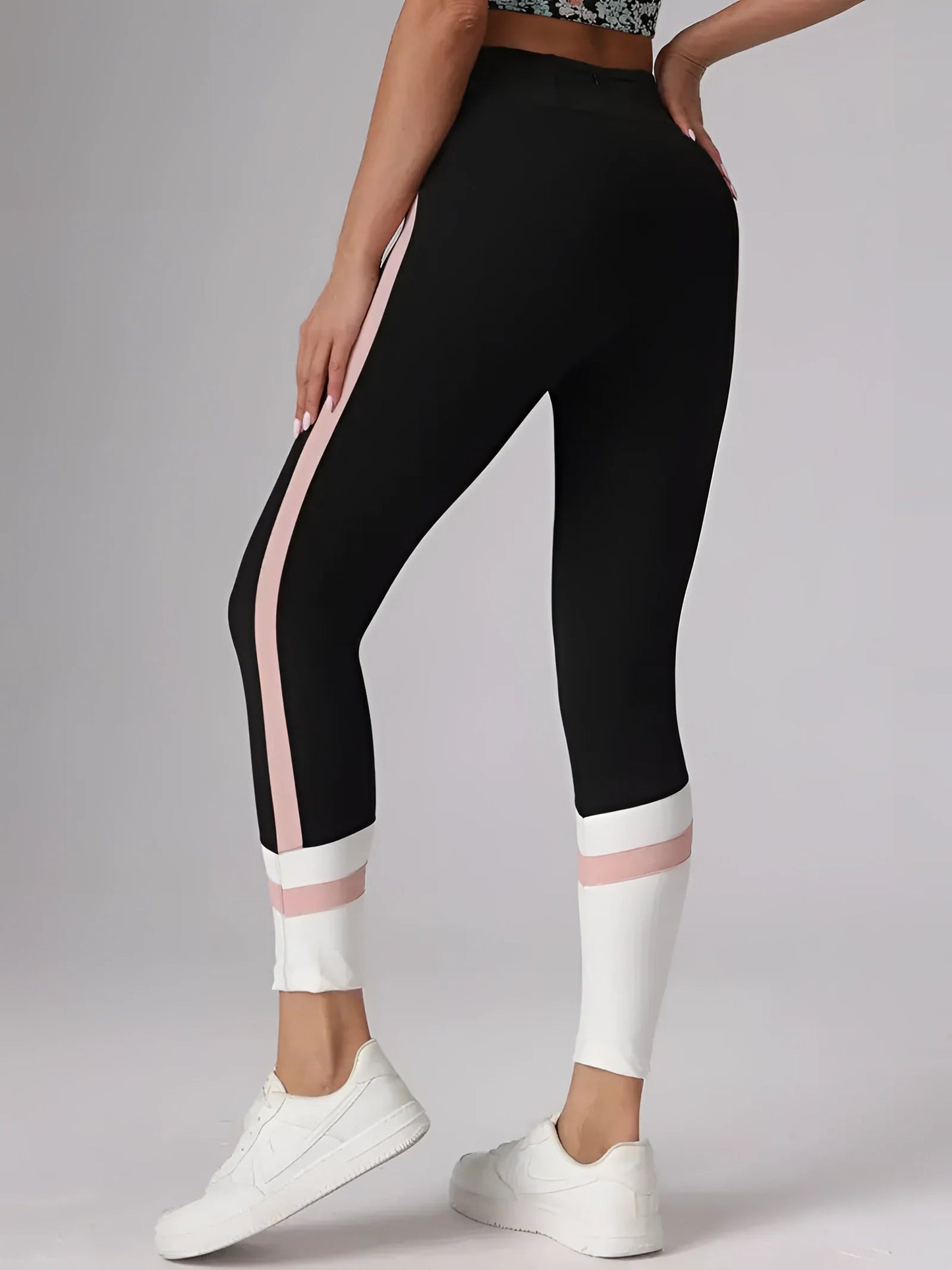 Zwarte hoge taille yogabroek met roze streep ademend