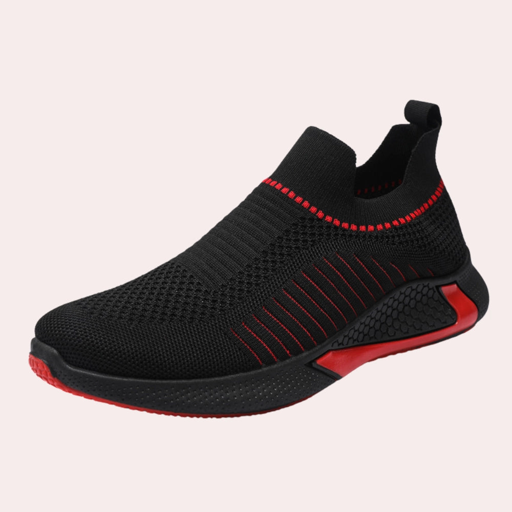 Zwarte instap sneaker met rood ademend en flexibel