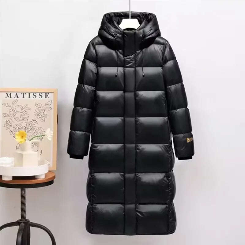 Zwarte dames winterparka met capuchon waterdicht elegant