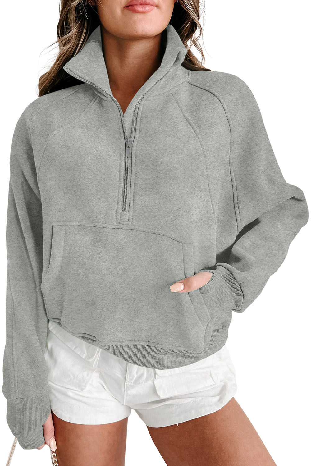 Stijlvolle Bruine Sweatshirt met Rits, Opstaande Kraag en Duimgaten – Perfect voor Casual Comfort