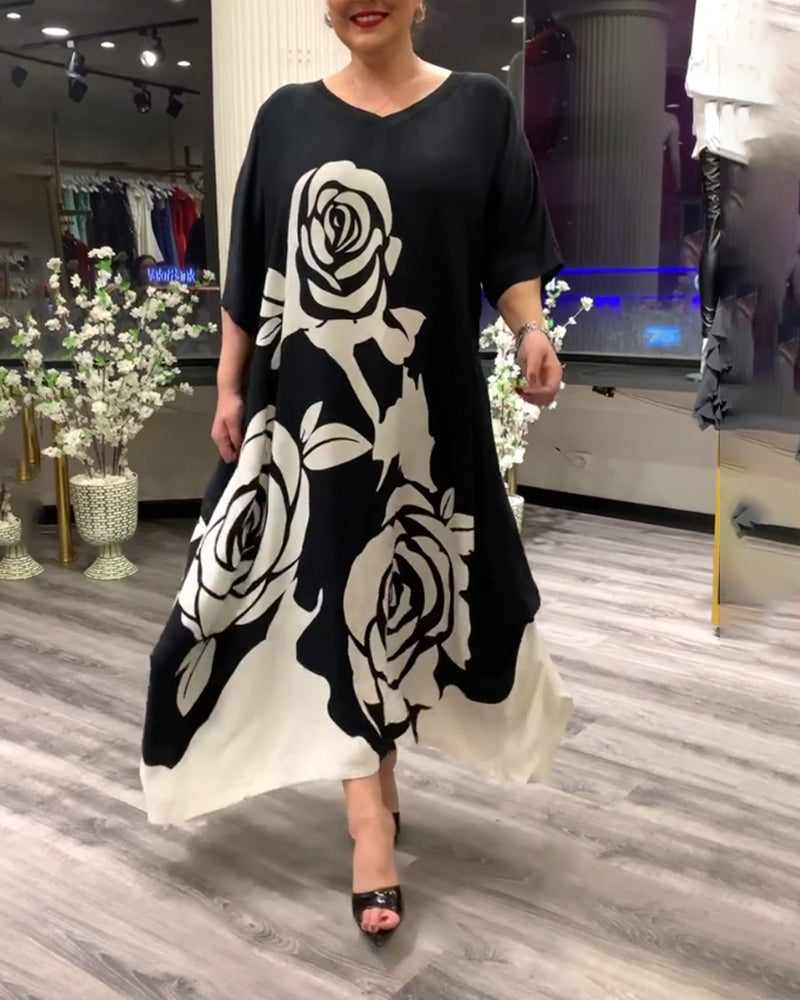 Zwarte jurk met rozenprint elegant design