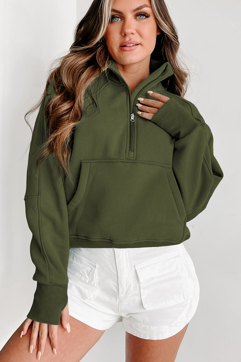 Stijlvolle Bruine Sweatshirt met Rits, Opstaande Kraag en Duimgaten – Perfect voor Casual Comfort
