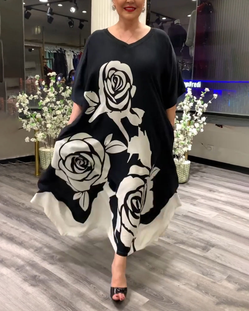 Zwarte jurk met rozenprint elegant design