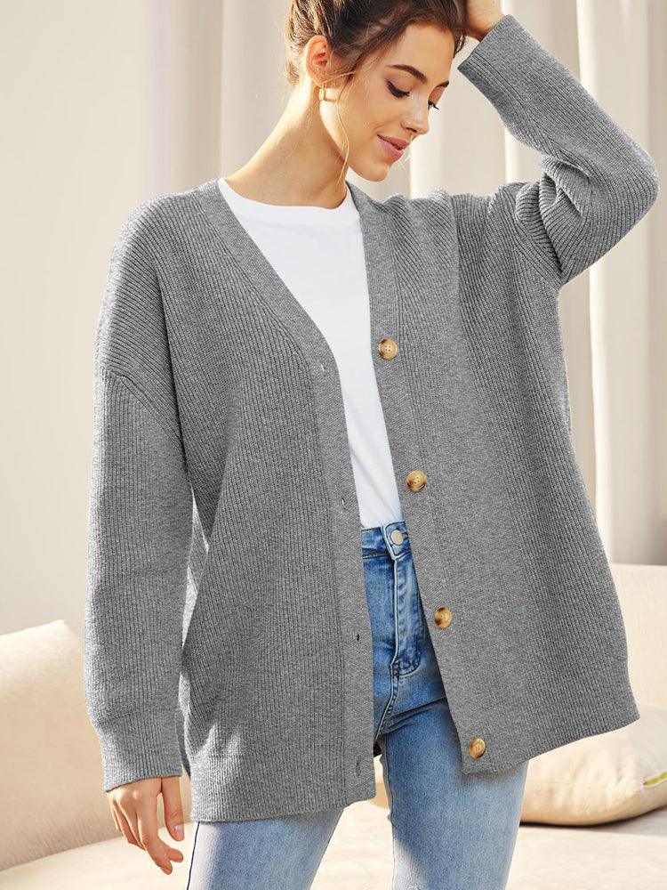 Erika's Elegantie: Stijlvol los gebreid damesvest met knopen voor herfst en winter