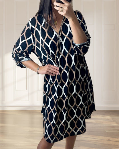 Zwarte jurk met rits en ruitpatroon elegant design