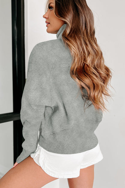 Stijlvolle Bruine Sweatshirt met Rits, Opstaande Kraag en Duimgaten – Perfect voor Casual Comfort
