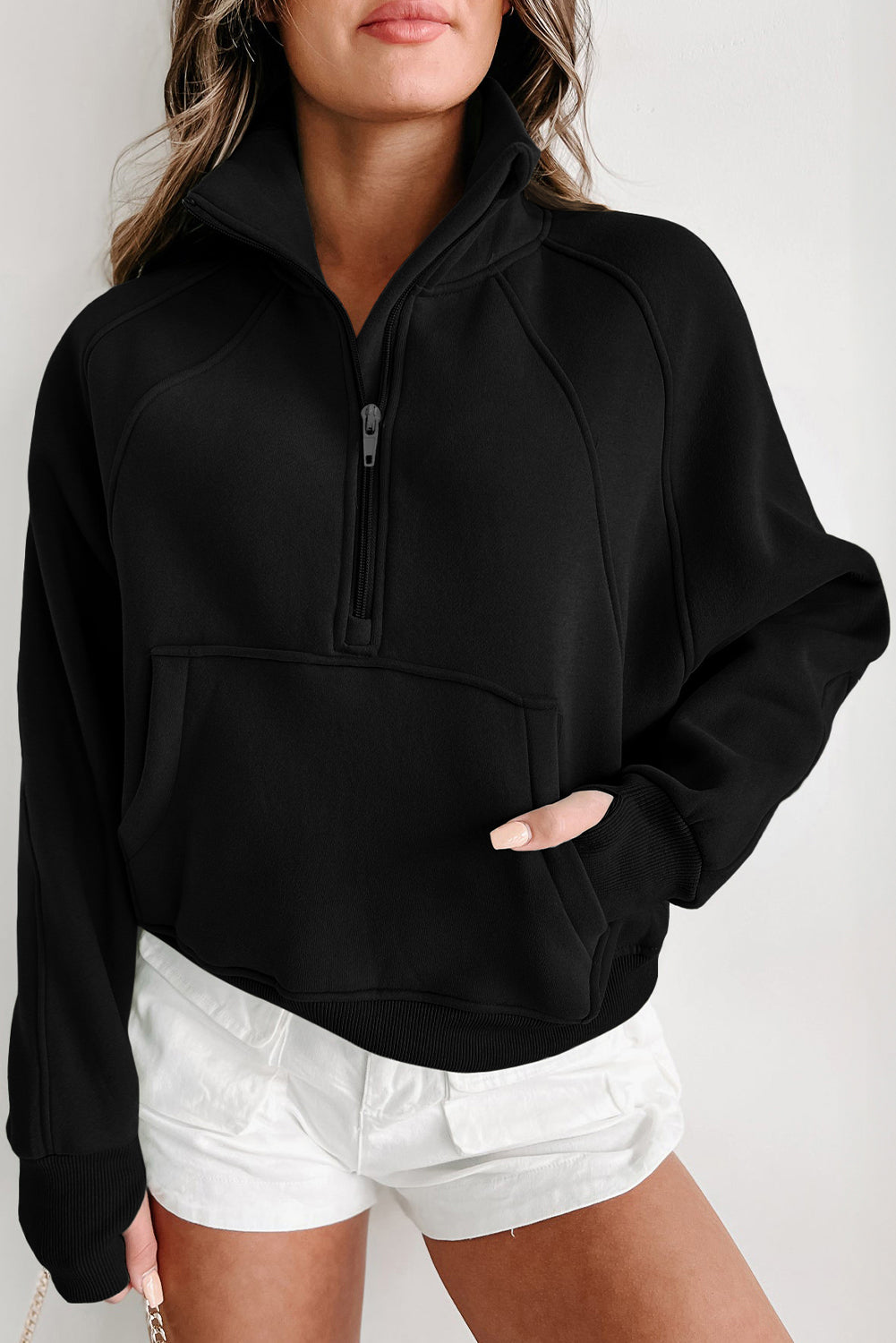 Stijlvolle Bruine Sweatshirt met Rits, Opstaande Kraag en Duimgaten – Perfect voor Casual Comfort