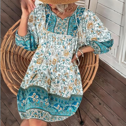 Zomerjurkje met bloemenprint in navy pink yellow green