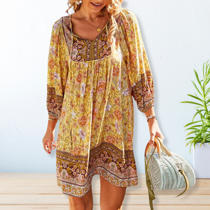 Zomerjurkje met bloemenprint in navy pink yellow green