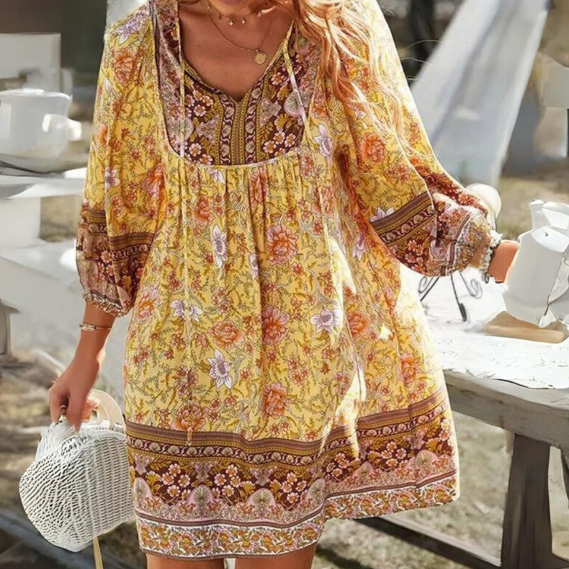 Zomerjurkje met bloemenprint in navy pink yellow green
