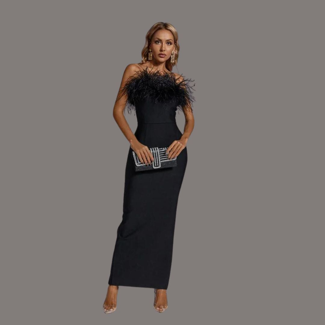 Zwarte feestjurk met veren voor een elegante look