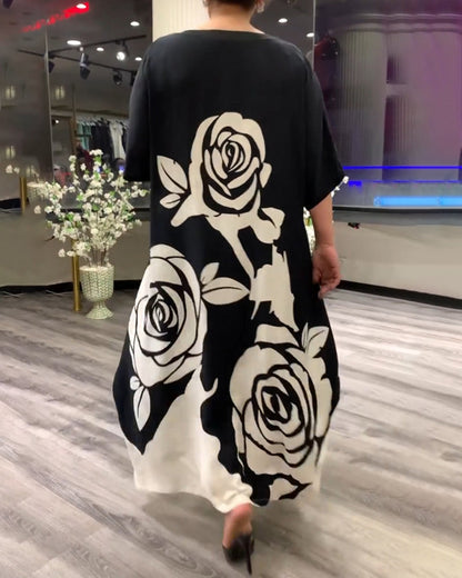 Zwarte jurk met rozenprint elegant design