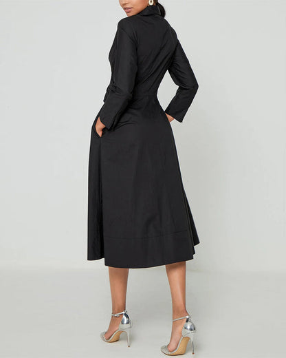 Zwarte jurk met gekruiste bandjes en zakken elegant