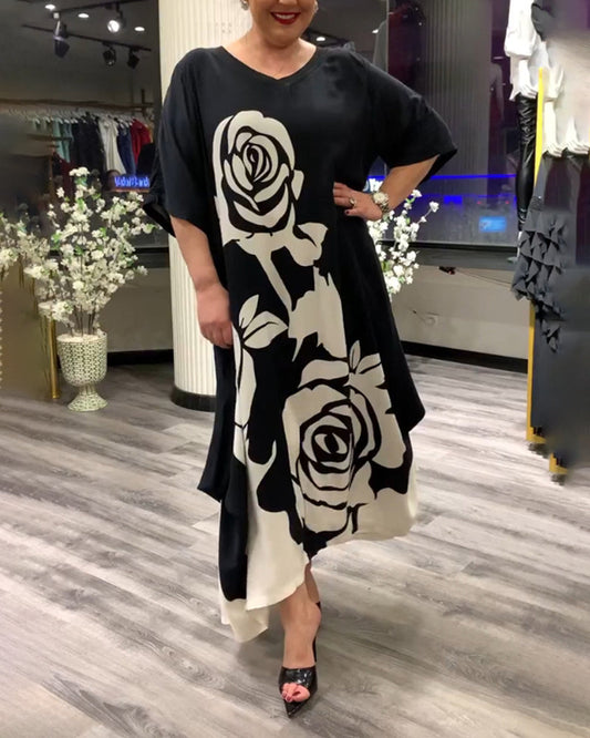 Zwarte jurk met rozenprint elegant design