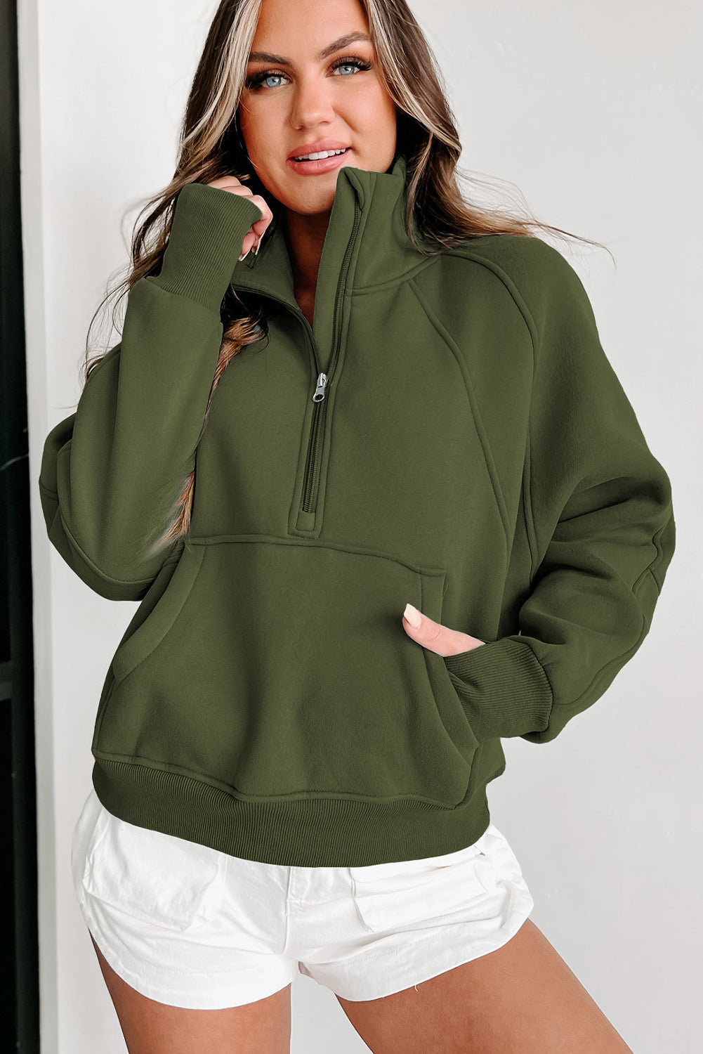 Stijlvolle Bruine Sweatshirt met Rits, Opstaande Kraag en Duimgaten – Perfect voor Casual Comfort