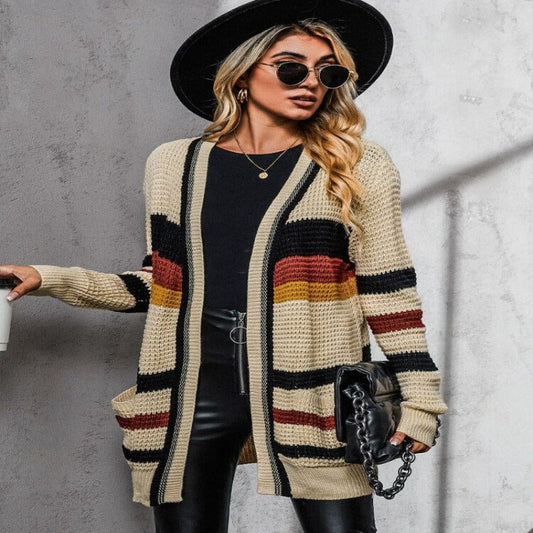 Stijlvol abrikoos oversized kasjmier gebreid damesvest met V-hals, ideaal voor de winter