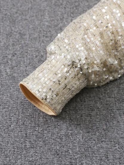 Glamoureuze paillettenjurk met contrast voor onvergetelijke feestavonden