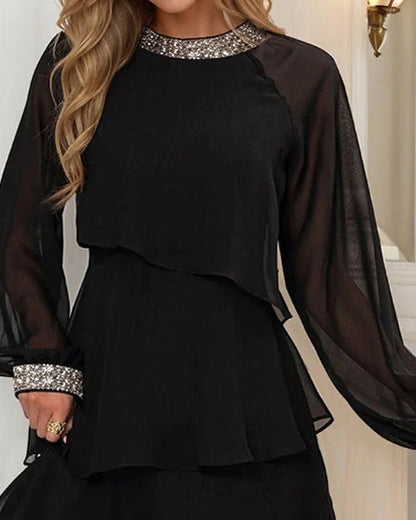 Zwarte elegante jurk met mesh voor een stijlvolle look