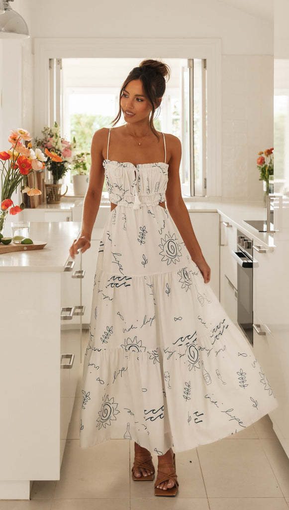 Zomerjurk met bandjes en open rug in elegant kantpatroon
