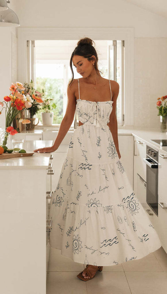 Zomerjurk met bandjes en open rug in elegant kantpatroon