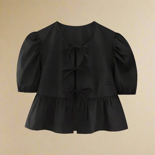 Zomerse katoenen blouse met strik en pofmouwen