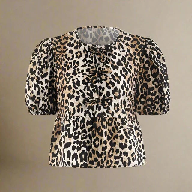 Zomerse katoenen blouse met strik en pofmouwen