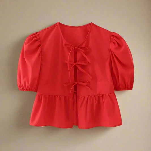 Zomerse katoenen blouse met strik en pofmouwen