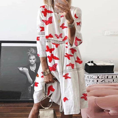 Zomerjurk met witte borduursels en kanten V-hals elegant