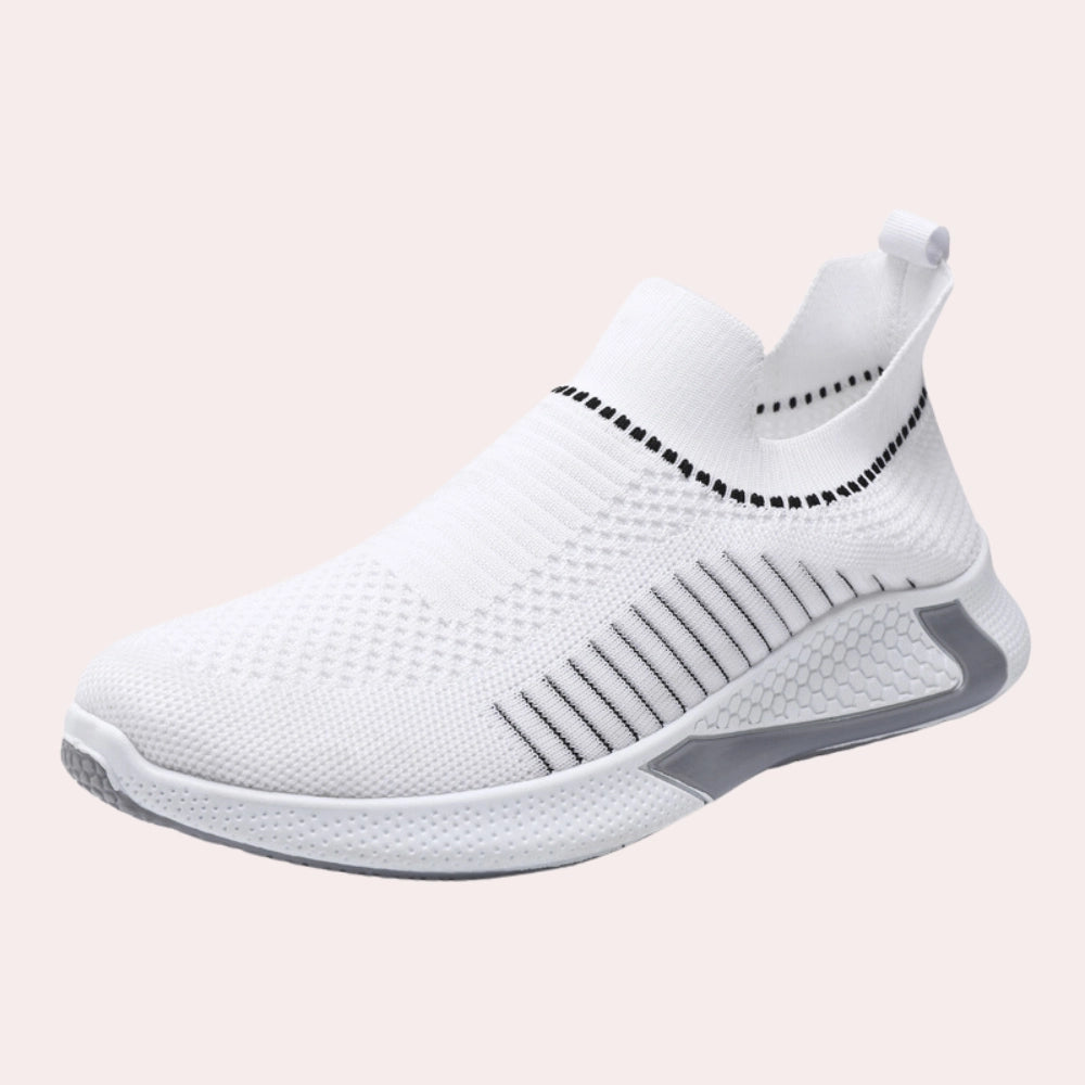 Zwarte instap sneaker met rood ademend en flexibel