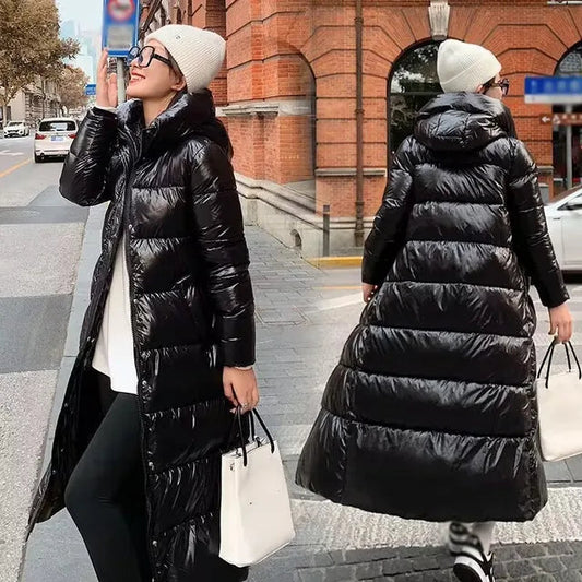 Zwarte dames winterparka met capuchon waterdicht elegant