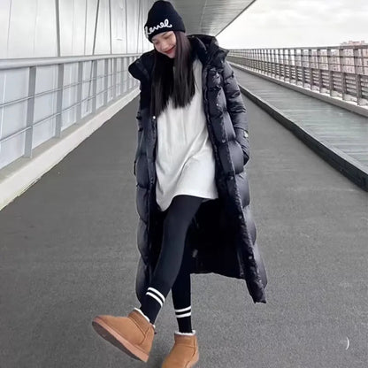 Zwarte dames winterparka met capuchon waterdicht elegant