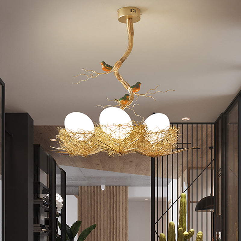 Art Deco glazen kroonluchter met gouden vogelmotief voor de woonkamer