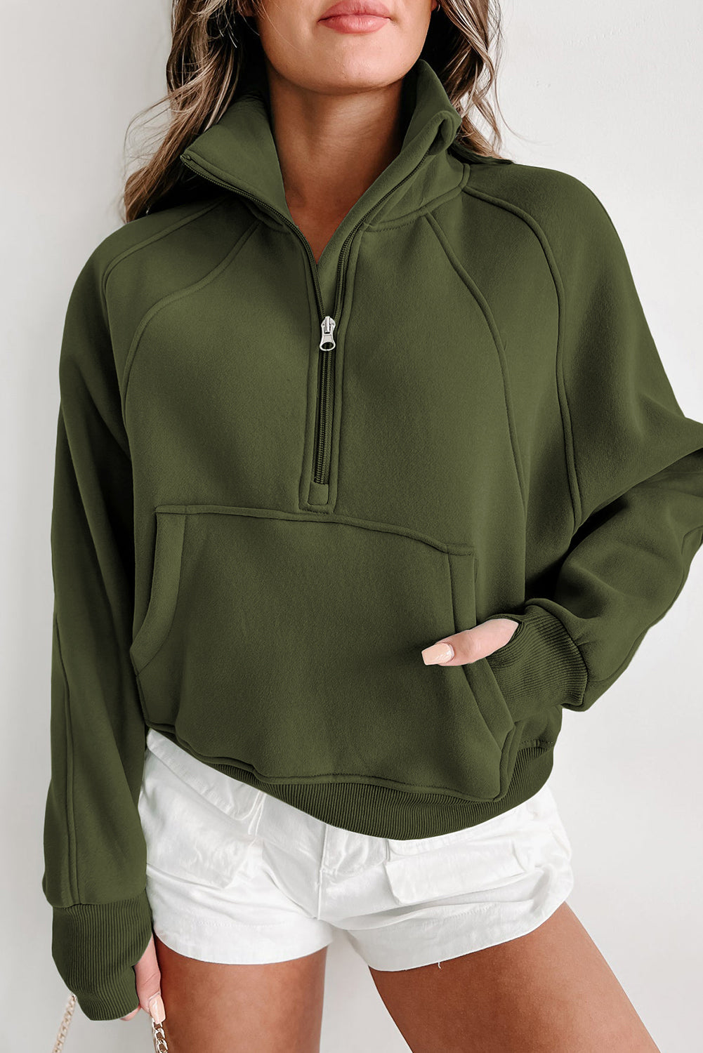 Stijlvolle Bruine Sweatshirt met Rits, Opstaande Kraag en Duimgaten – Perfect voor Casual Comfort