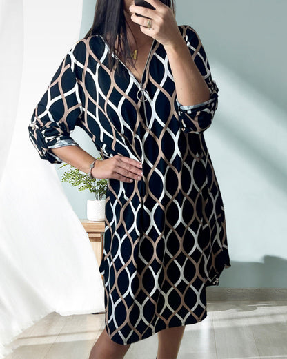 Zwarte jurk met rits en ruitpatroon elegant design