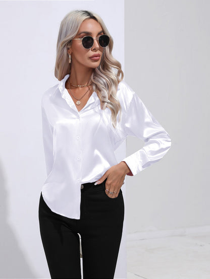 Zijden roze damesblouse met omgeslagen kraag elegant