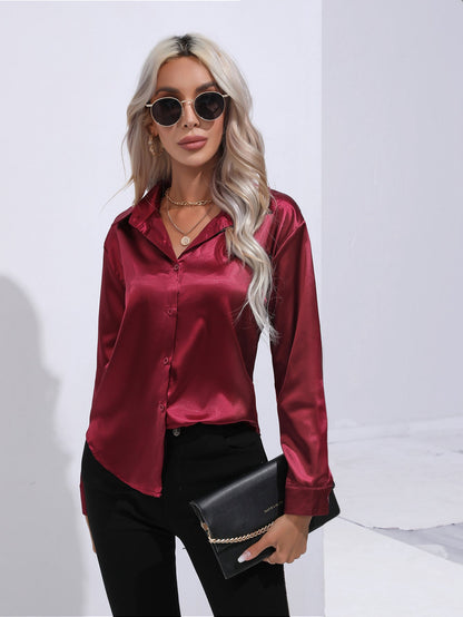 Zijden roze damesblouse met omgeslagen kraag elegant