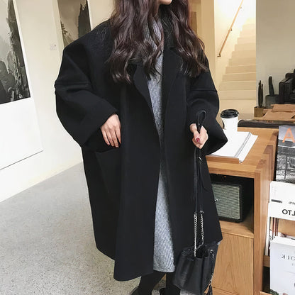 Zwarte oversized wollen trenchcoat dames elegant