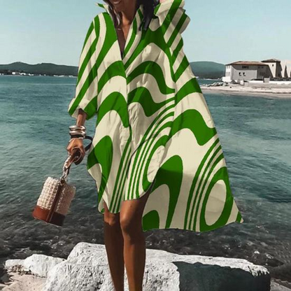 Zwarte knielange jurk met groene print elegant
