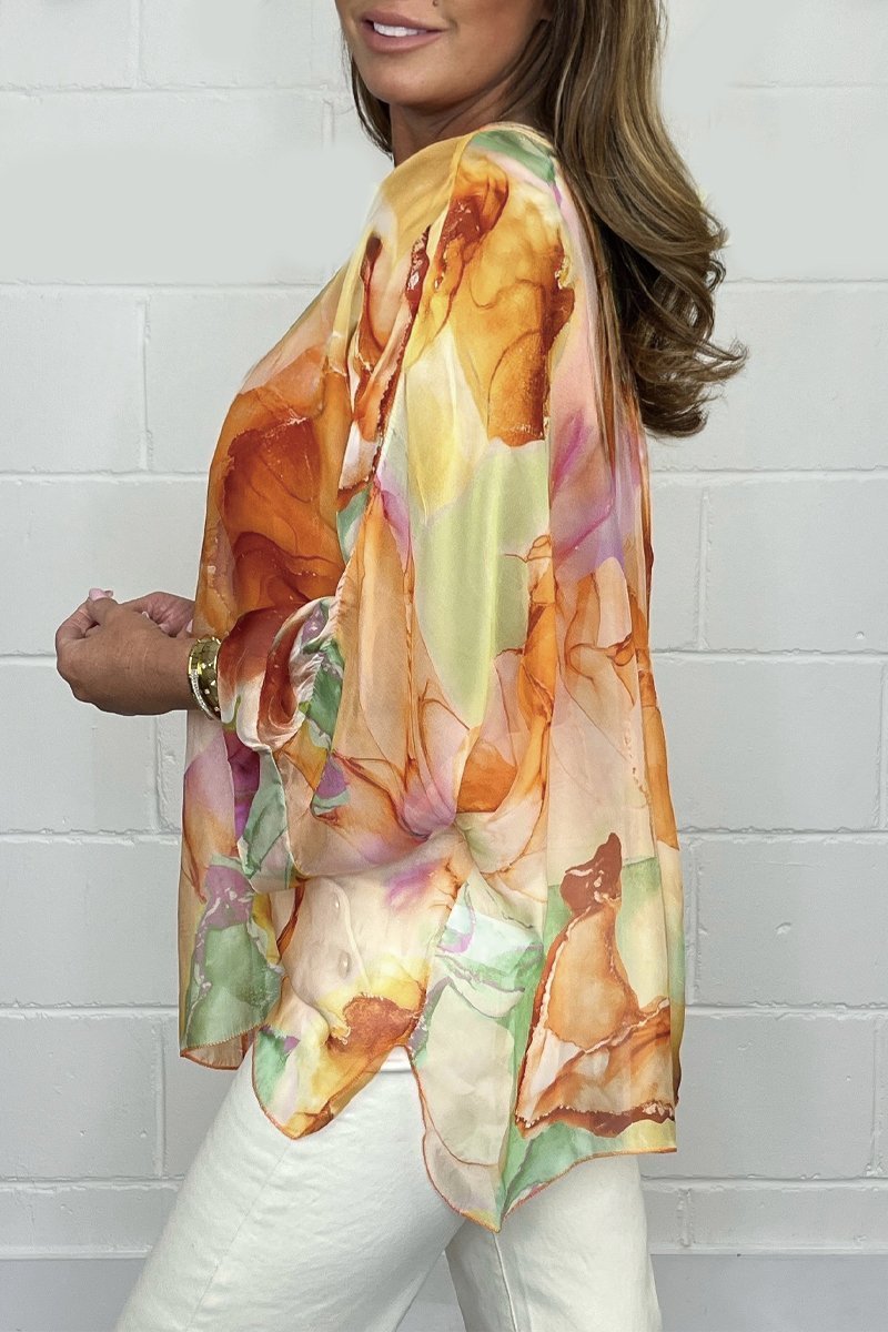 Zomerse dames blouse met bloemenprint en pofmouwen