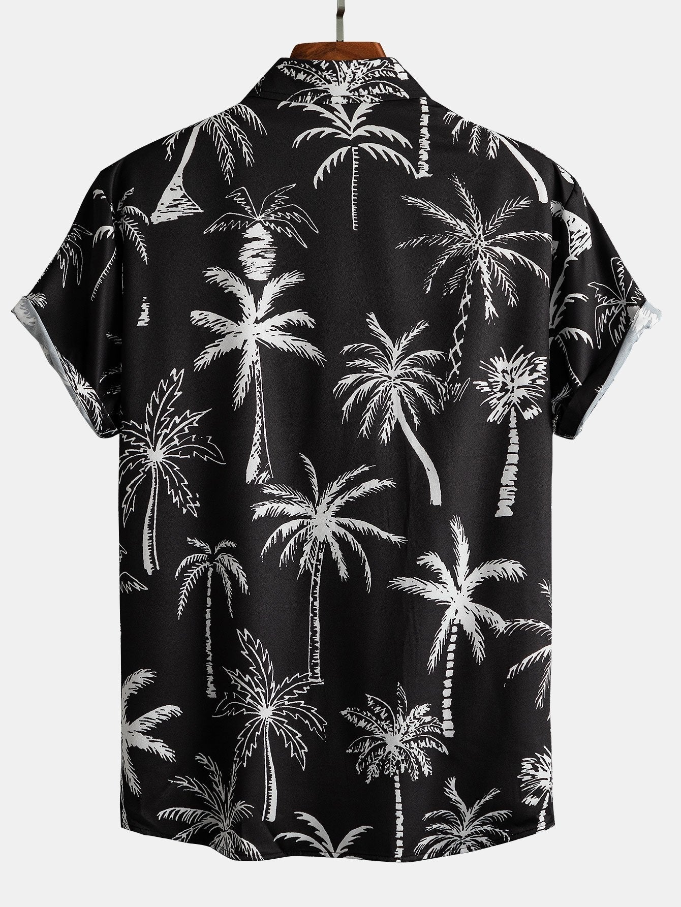 Zwarte rok met oranje palmprint en knoopsluiting