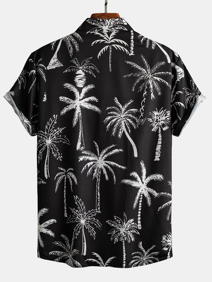 Zwarte rok met oranje palmprint en knoopsluiting