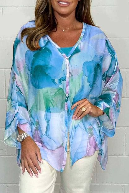 Zomerse dames blouse met bloemenprint en pofmouwen